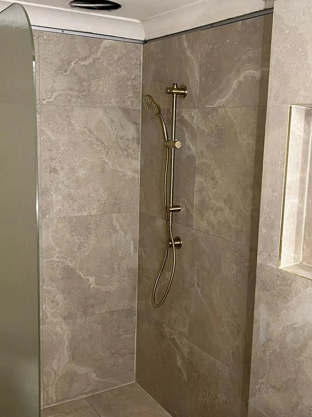 Brushed brass shower